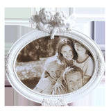 cadre-photo-ovale-en-resine-blanc-argente-retro