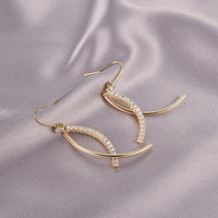 niche-vintage-boucles-doreilles-irregulieres
